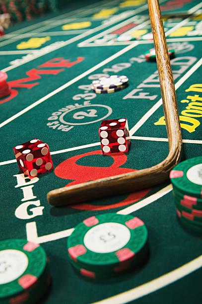 Roulette: place chips on numbers or sections before the wheel spins Roulette wheel spinning with betting layout showing chip placement options